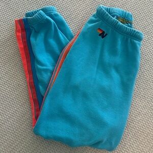 Aviator Nation Blue Joggers with Rainbow Stripe